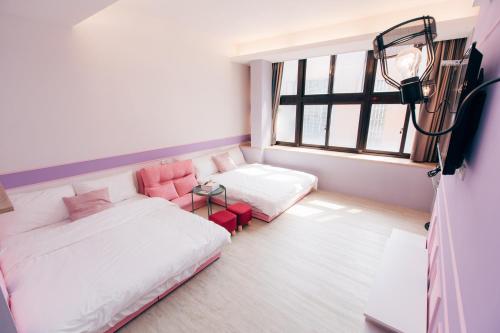 Katil atau katil-katil dalam bilik di Chu's Home類包棟家庭房#本國旅客須先匯款
