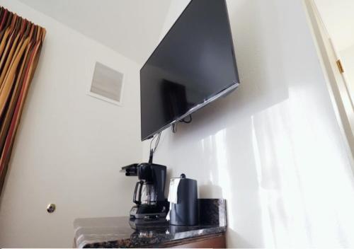TV a/nebo společenská místnost v ubytování Los Abrigados Resort and Spa