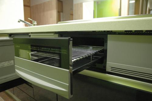 a microwave oven sitting on top of a counter at Kamikatsura House in Kyoto