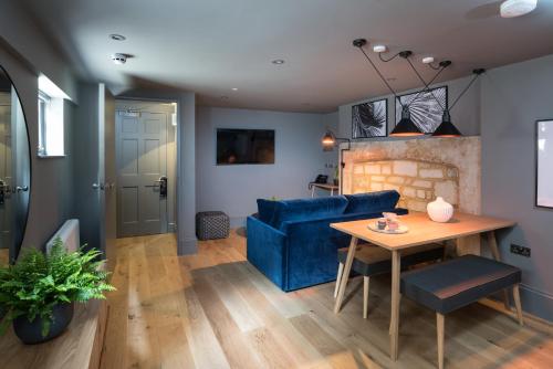 TV o dispositivi per l'intrattenimento presso Hiding Space - Trim Street Apartments