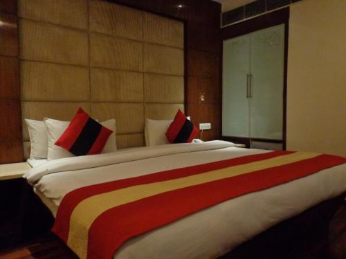 Cama o camas de una habitación en Hotel Aura - New Delhi Railway Station