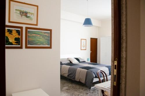 Katil atau katil-katil dalam bilik di Casa Gentile Carducci