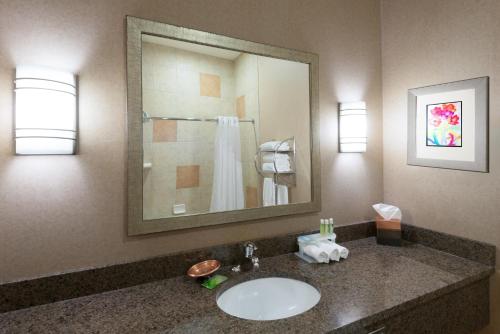 a bathroom with a sink and a mirror at Holiday Inn Express Hotel Vernal by IHG in Vernal