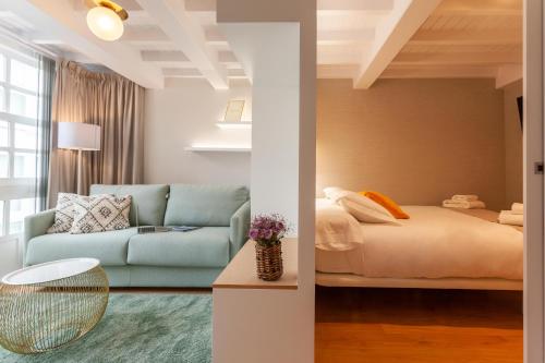 Postel nebo postele na pokoji v ubytování APARTAMENTOS FRANJA 55