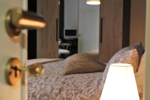 A bed or beds in a room at B&B Relais Aeclanum