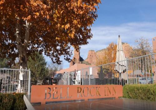 a sign that says bell rock on a fence at Bell Rock Inn in Sedona