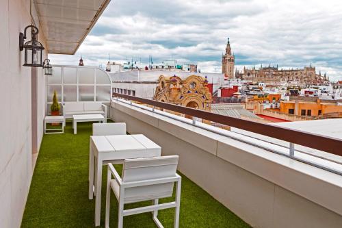 Балкон или терраса в Hotel Inglaterra