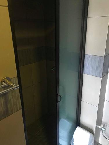 Ένα μπάνιο στο Al - Minhaj Service Apartments