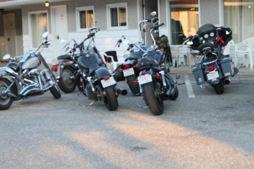 motorcycles parked in front of a building at Paradise Motel in Sicamous