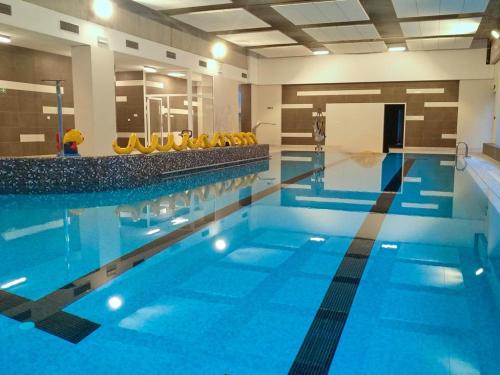Bazén v ubytovaní Aquamarina Onyx 109 alebo v jeho blízkosti