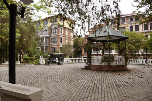 a gazebo in the middle of a city at Park Village Resort by KGH Group in Kathmandu