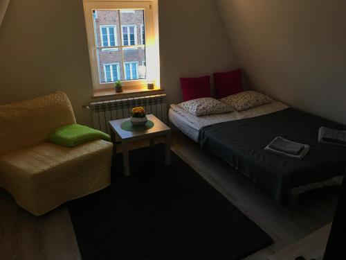 Posedenie v ubytovaní Apartament na poddaszu