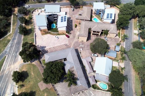 an overhead view of a house with a yard at Nelspruit Lodge in Nelspruit