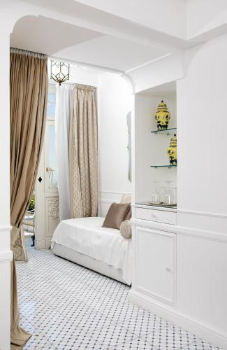 Postel nebo postele na pokoji v ubytování Luxury Villa Excelsior Parco