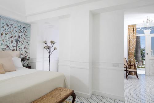 Postel nebo postele na pokoji v ubytování Luxury Villa Excelsior Parco