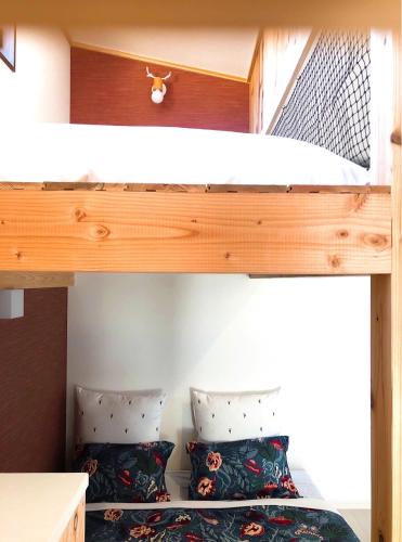 a bunk bed in a tiny house at Stay Nikko Guesthouse in Nikko