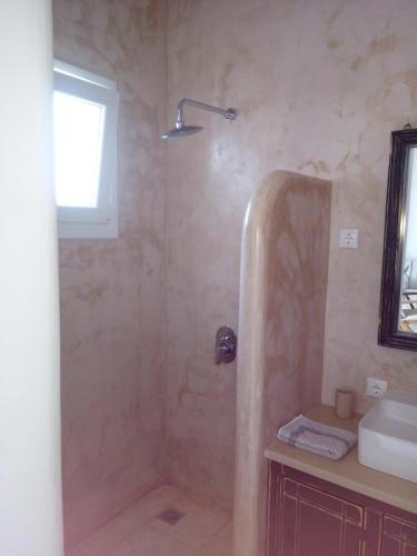 a bathroom with a shower and a sink at Antonios 1 in Matala