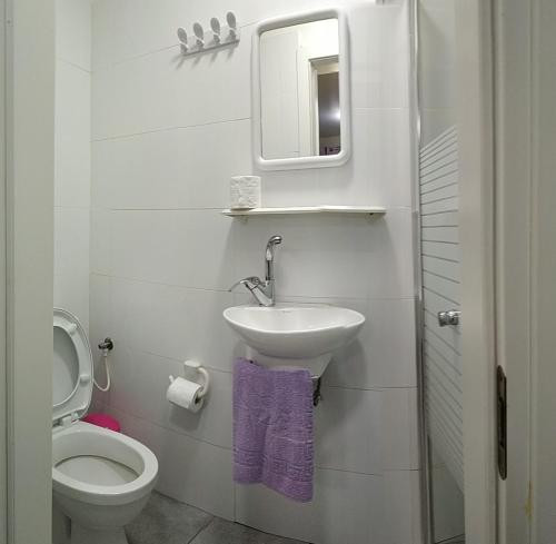 A bathroom at Beachfront Apartment Bat Yam 613