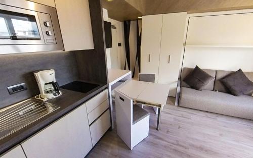Kuchyň nebo kuchyňský kout v ubytování Residence Toblini