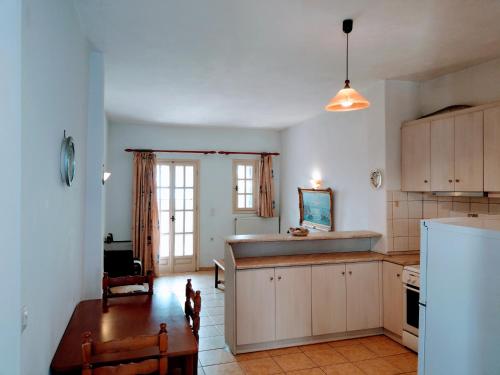 A kitchen or kitchenette at Chora Place