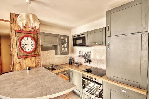 Dapur atau dapur kecil di Appartements résidence Roches Rouges