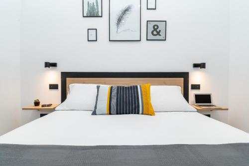 Postel nebo postele na pokoji v ubytování Vittoria Flat Sorrento