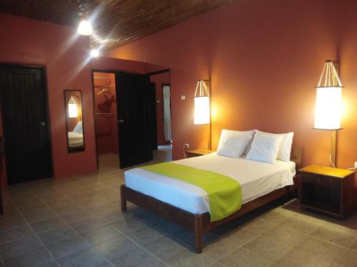 Postel nebo postele na pokoji v ubytování Cordillera Escalera Lodge