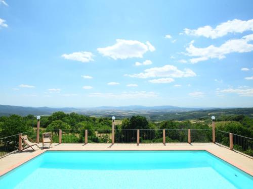 a swimming pool on the balcony of a house at Holiday Home La Fornace by Interhome in Roccastrada