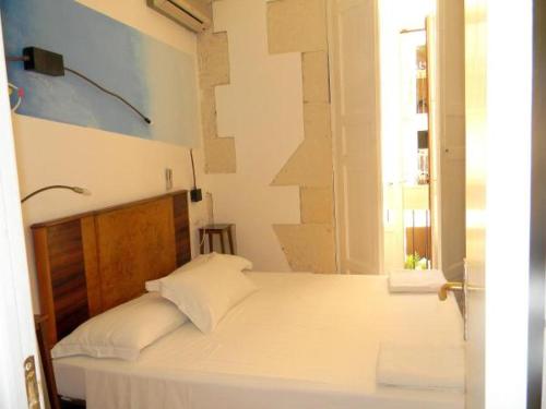 Cama o camas de una habitación en L'Acanto