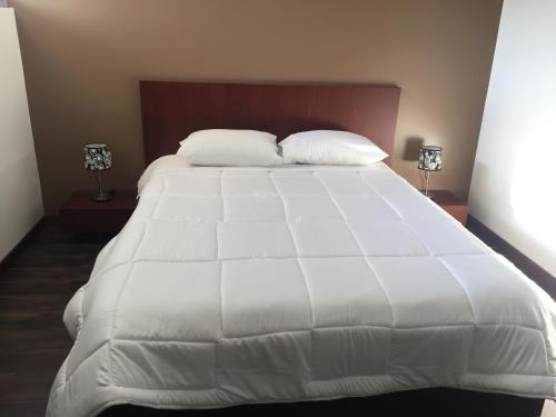 Ένα ή περισσότερα κρεβάτια σε δωμάτιο στο Apartamento Rinconcito de Luz