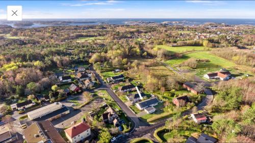 an aerial view of a small village with houses at Hagavägen 1 Lägenhet in Grebbestad