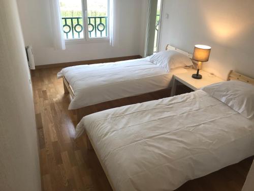 Un ou plusieurs lits dans un hébergement de l'établissement La Pommeray Geneva