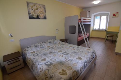 a bedroom with a bed and a ladder in it at B&B al Capitello in Trento