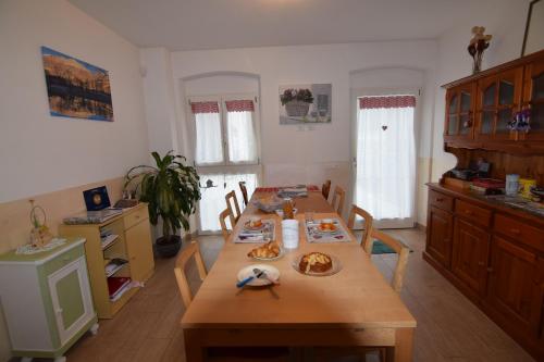 a kitchen with a table with food on it at B&B al Capitello in Trento
