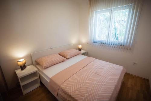 Postel nebo postele na pokoji v ubytování Lego