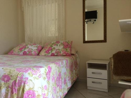Ліжко або ліжка в номері Pousada Rosa Norte