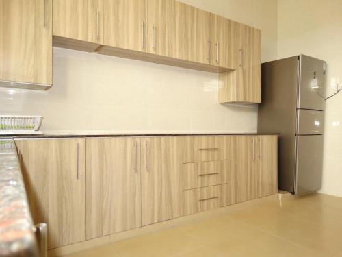 Η κουζίνα ή μικρή κουζίνα στο Nyali Golf View Residence