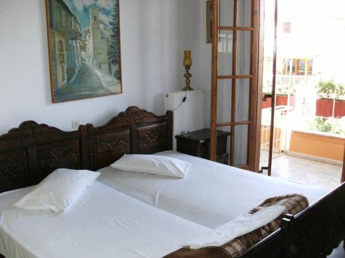 Кровать или кровати в номере Katerina Hotel