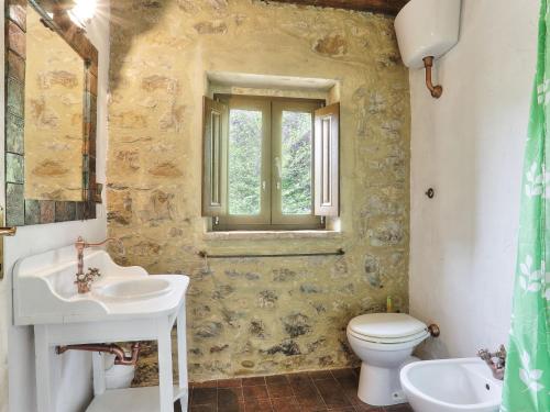Bilik mandi di Holiday Home Sweet Maremma by Interhome
