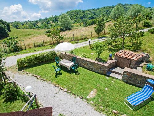 an aerial view of a garden with a table and chairs at Apartment Papavero by Interhome in Santa Fiora