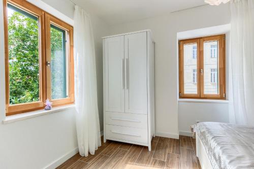 Postel nebo postele na pokoji v ubytování St.Lucija