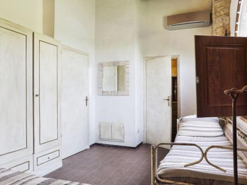 Katil atau katil-katil dalam bilik di Holiday Home Sweet Maremma by Interhome
