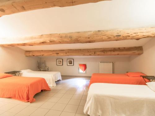 Postel nebo postele na pokoji v ubytování Holiday Home Patifiage by Interhome