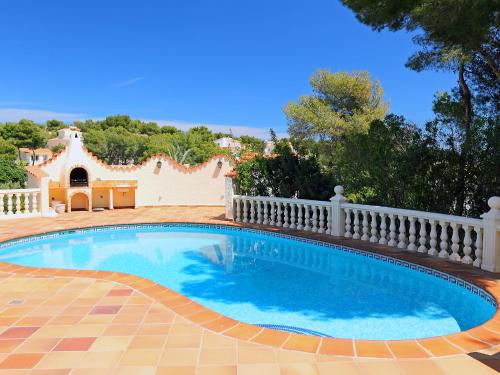 a swimming pool with a white fence around it at Holiday Home Balcon al Mar by Interhome in Balcon del Mar