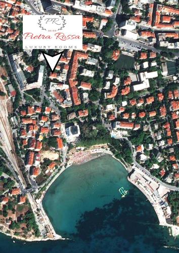 an aerial view of a city with a lake at Pietra Rossa in Split