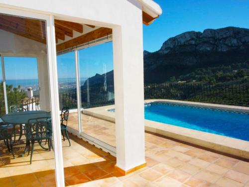 a house with a view of a swimming pool at Holiday Home Gabi by Interhome in Monte Pego