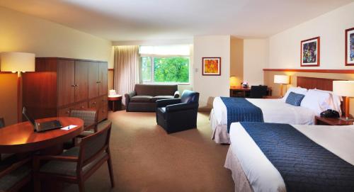 Ένα ή περισσότερα κρεβάτια σε δωμάτιο στο The Penn Stater Hotel and Conference Center