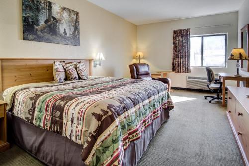 Katil atau katil-katil dalam bilik di Booneslick Lodge - Neosho