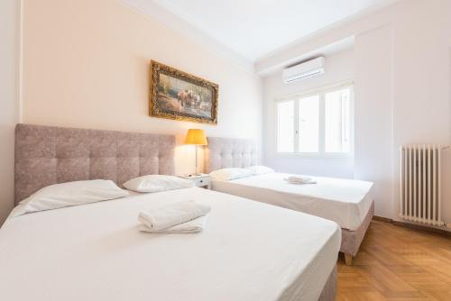 Lova arba lovos apgyvendinimo įstaigoje Athens Empire Paradise Apartment