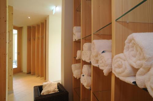 a room with a bunch of towels in a closet at Natur & Wellnesshotel Breggers Schwanen - Bernau im Schwarzwald in Bernau im Schwarzwald